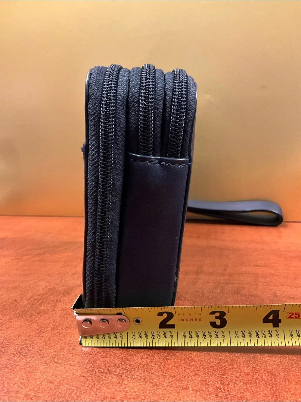 Tumi Navy Leather Toiletry Wrist Pouch